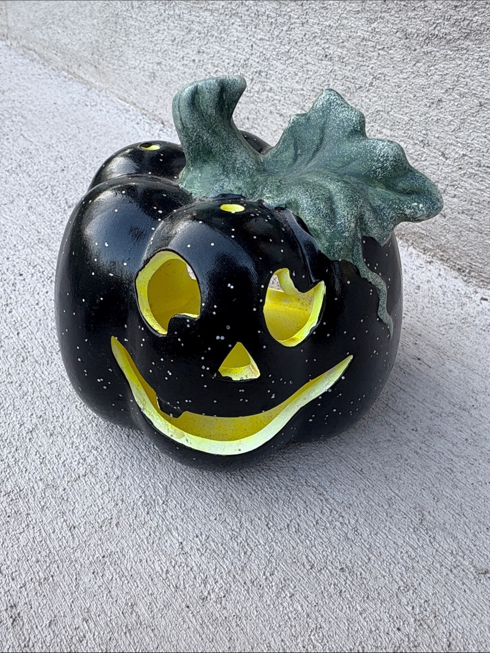 Black Ceramic Jack-O'-Lantern Candle Holder with Green Stem